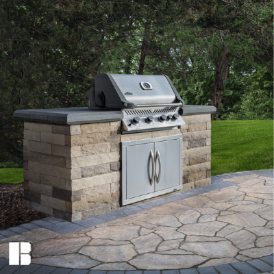 Outdoor kitchen with Belgard pavers and stone 